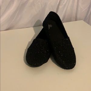 Black sparkle slip on shoes